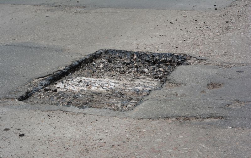 How Weather Conditions Affect Asphalt Cracks And Potholes